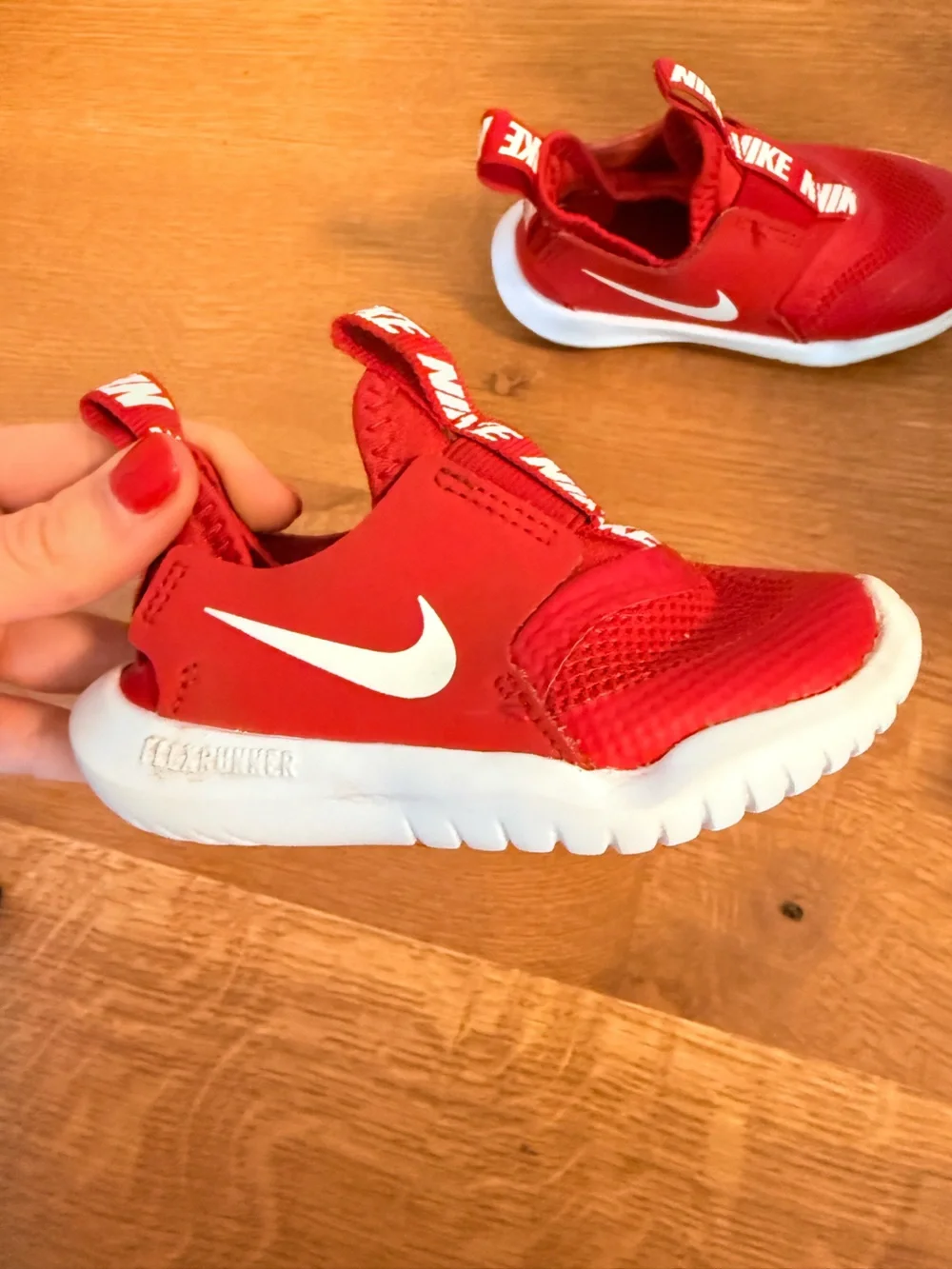Nike Kids Red Slip-On Sneakers with White Swoosh